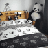 Une housse de couette PANDA